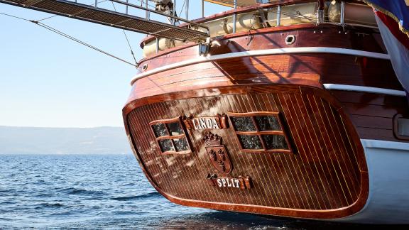 Traditional gulet Linda from Split, Croatia, with a beautiful wooden design and the inscription Linda Split.